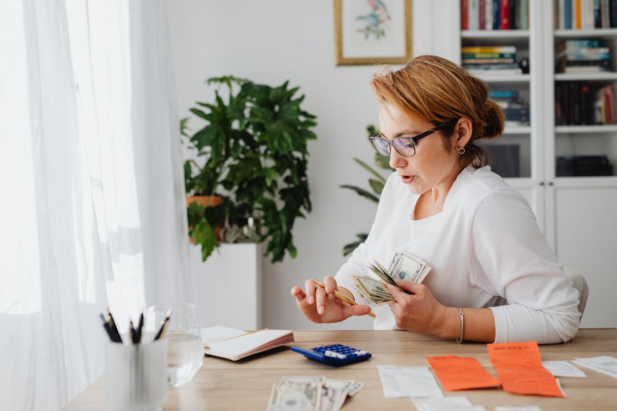 a woman using a calculator